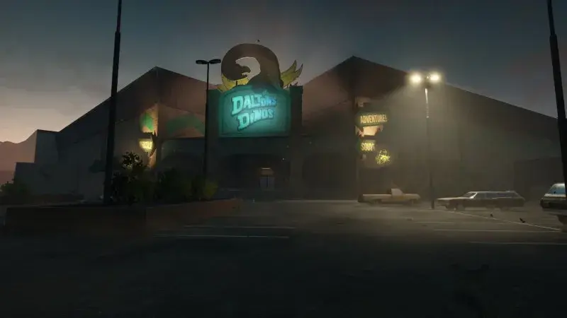 Dalton's Dinos exterior with an illuminated sign and parked cars