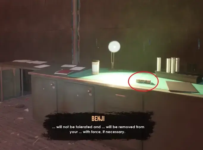A cylindrical replacement fuse circled on an illuminated workbench.