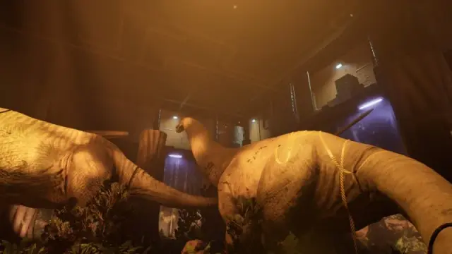 Large dinosaur displays with raised platforms above their backs